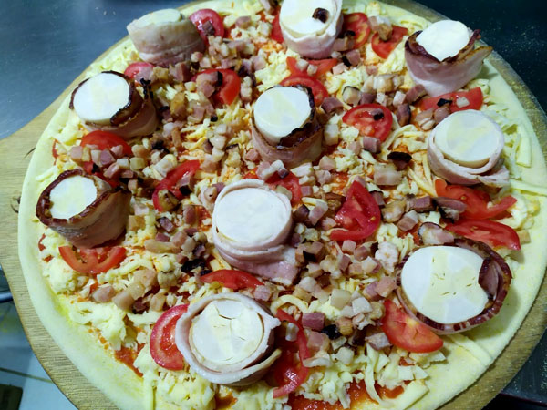 Divulgação - Pizza de palmito especial tem entre seus ingredientes um delicioso medalhão de palmito Divulgação - Pizza de palmito especial tem entre seus ingredientes um delicioso medalhão de palmito