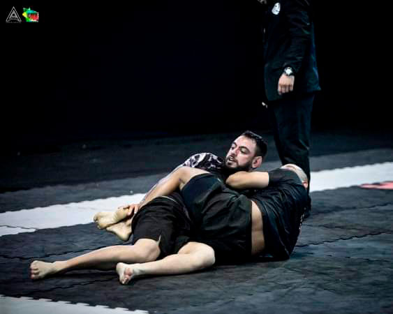 Divulgação - Guto Ferreira em luta que garantiu medalha de bronze - Foto: Divulgação Divulgação - Guto Ferreira em luta que garantiu medalha de bronze - Foto: Divulgação
